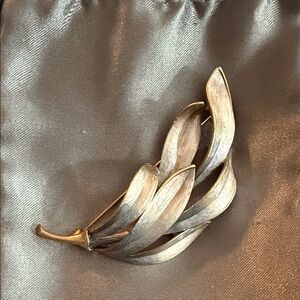 Elegant Gold and Silver Leaf Brooch